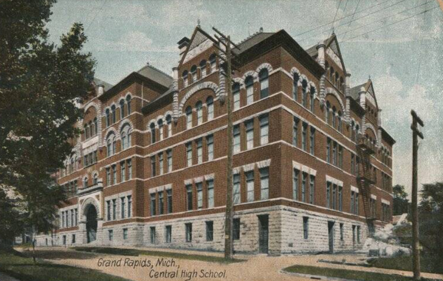 Early 1900s postcard of Grand Rapids Central High School, a brick building with stone trim