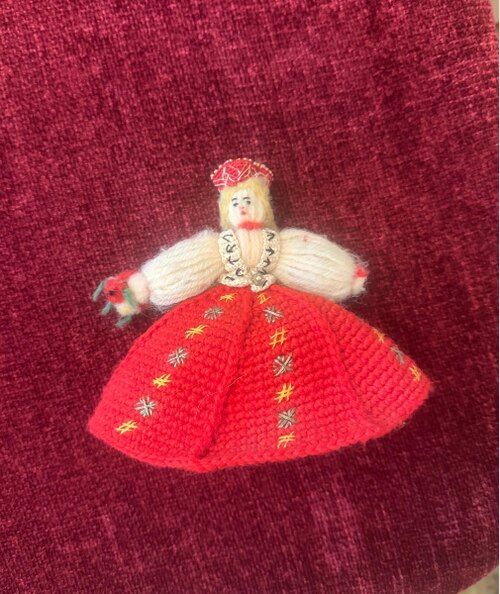 A small handmade Latvian folk costume doll, a family heirloom