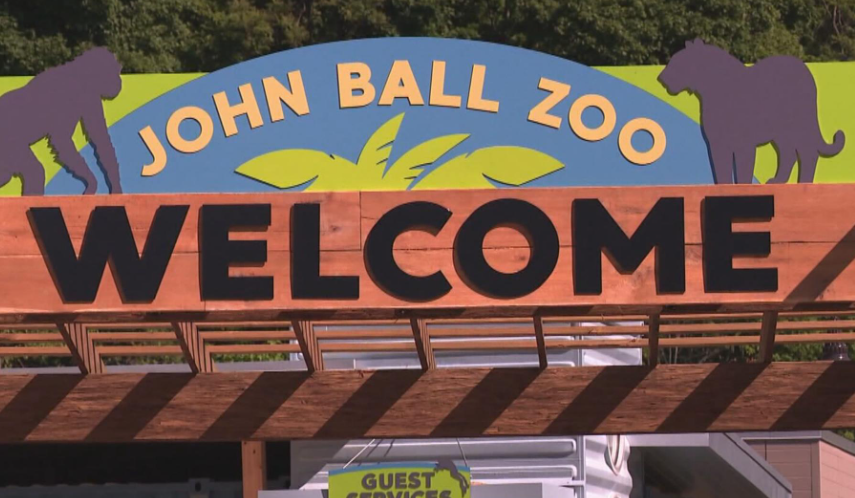The John Ball Zoo welcome sign with its wooden entrance